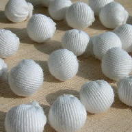 White gabardine cloth ball buttons