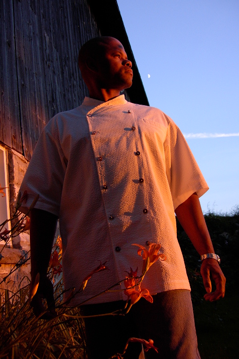 Chef Coat Style BSM101: Shown in White, 100% cotton seersucker, left chest tailored welt pocket, short sleeves & Abalone buttons.