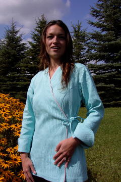 Women's Chef Coat Style BSW106: Shown in Aqua, 100% cotton Honeycomb pique with pink sham piping (cuffs, collar & front).