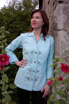 Image of Women's Chef Coat (Chef Jacket) Style BSW109: Shown in Aqua, 100% cotton, decorative knot embroidery (eight on the front & one on center back) & concho buttons.